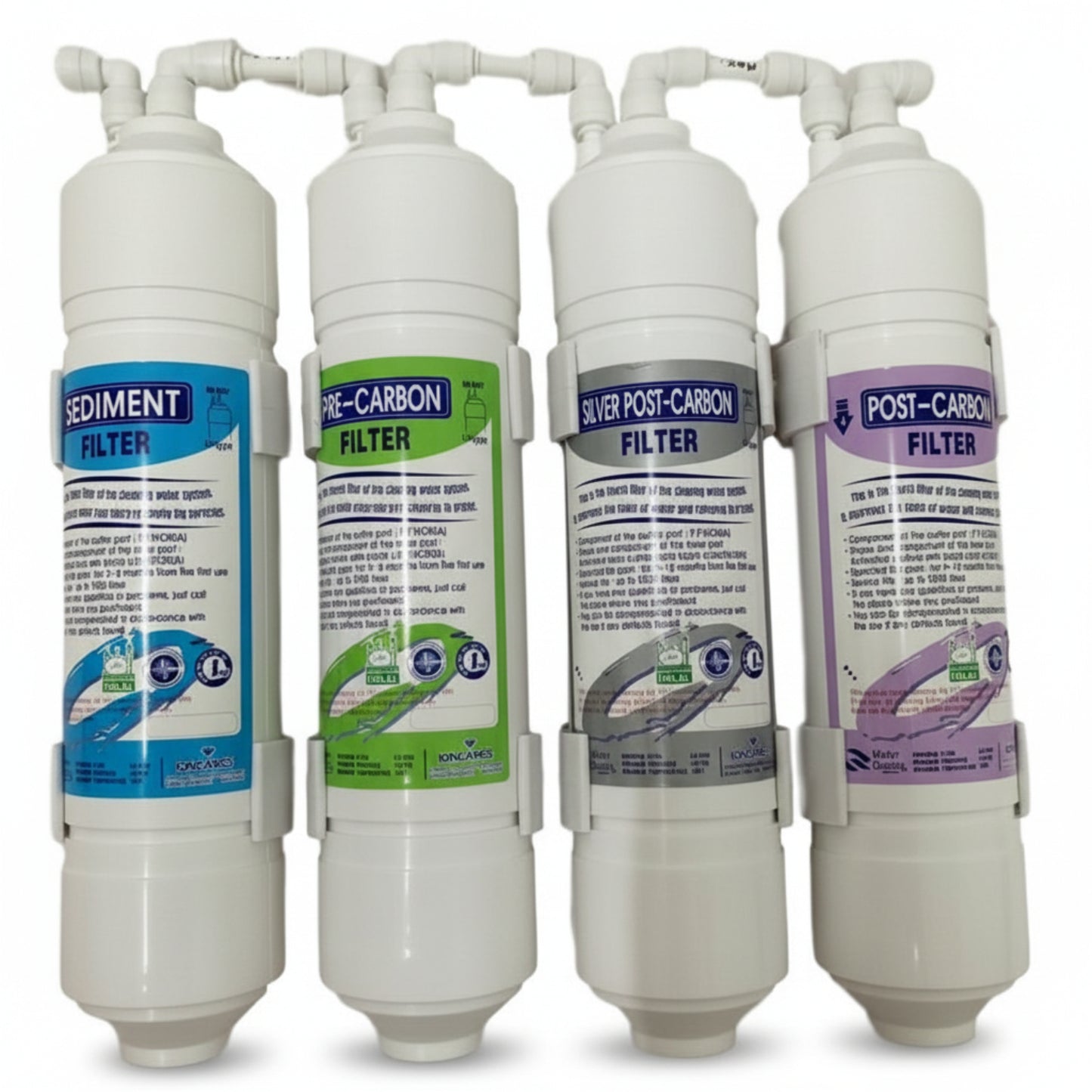 four water filters for Avesa Water System, Sediment Filter (blue label), Pre-Carbon Filter (green label), Silver Post-Carbon Filter (silver label), Post-Carbon Filter (purple label)
