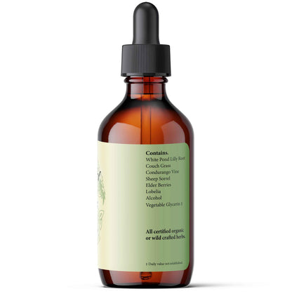 Bottle of herbal tincture with dropper on a white background
