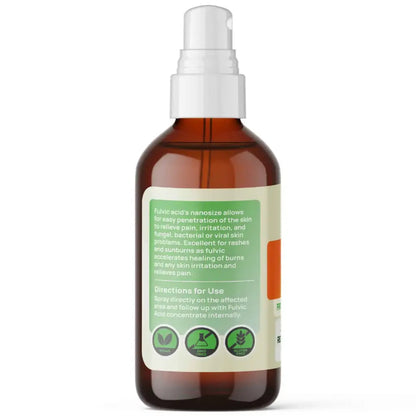 Brown spray bottle with a label on a white background