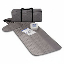 Gray travel mat with carrying bag and small box on a white background