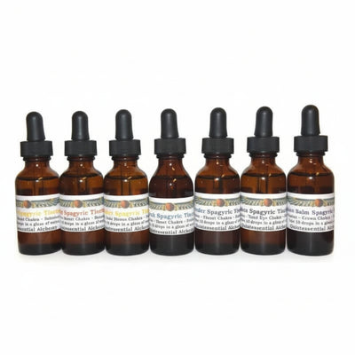 seven dark brown dropper bottles of Spagyric Tinctures 1. Rosemary Spagyric Tincture (Sunday, Solar Plexus Chakra) 2. Maca Spagyric Tincture
(Monday, Third Eye Chakra), 3. Nettle Spagyric Tincture (Tuesday, Sacral Chakra) 4. Lavender Spagyric Tincture (Wednesday, Throat Chakra) 5. Lemon Balm Spagyric Tincture (Thursday, Crown Chakra) 6. Burdock Spagyric Tincture (Friday, Heart Chakra) 7. Horsetail Spagyric Tincture (Saturday, Root Chakra)