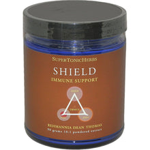 Jar of SuperTonicHerbs Shield immune support supplement on a white background