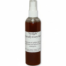 Bottle of 'Twilight Topically Everything spray with a white label on a white background