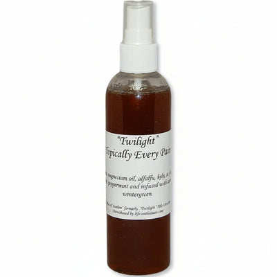 Bottle of 'Twilight Topically Everything spray with a white label on a white background