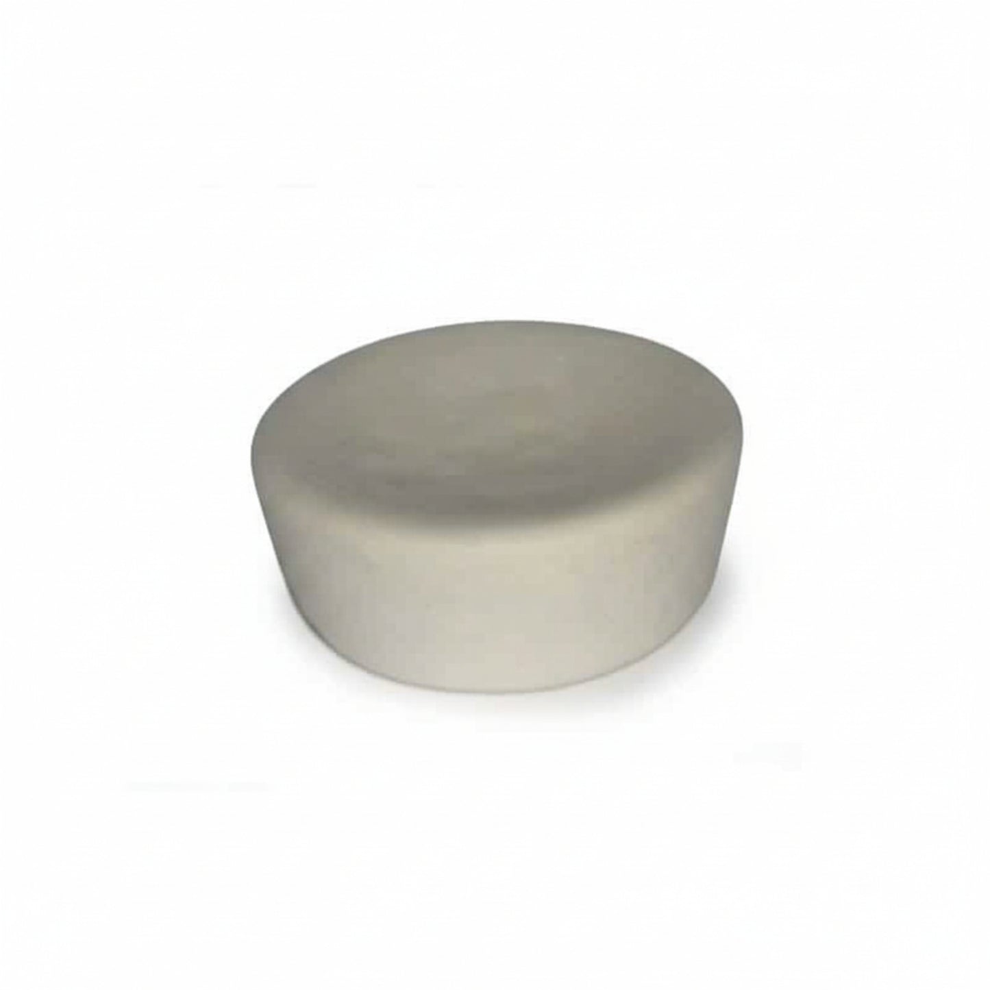 Round ivory cupcake-shaped device on a white background