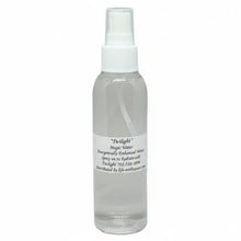 Clear spray bottle of Twilight Magic Water with a white label on a white background