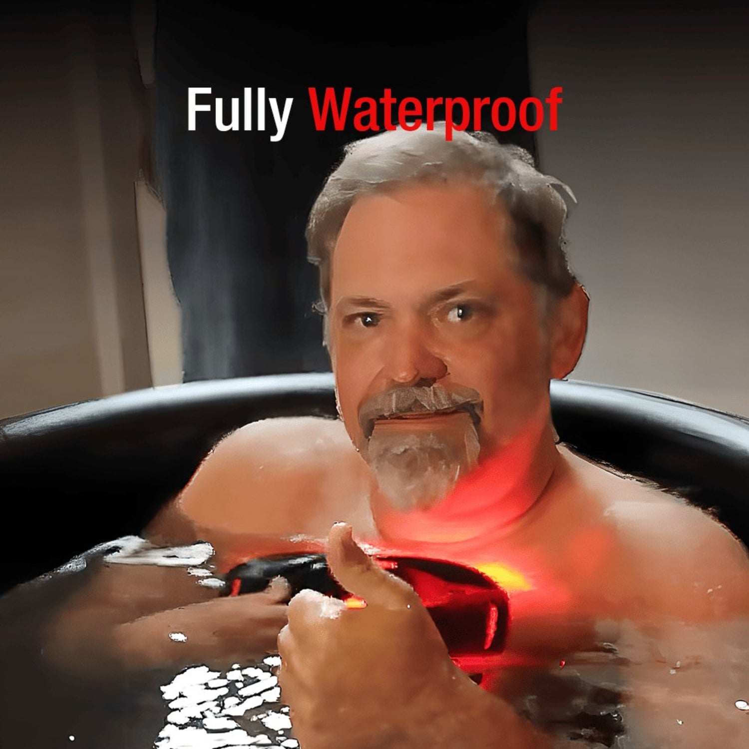 Man in a bathtub with a device labeled 'Fully Waterproof' on a dark background