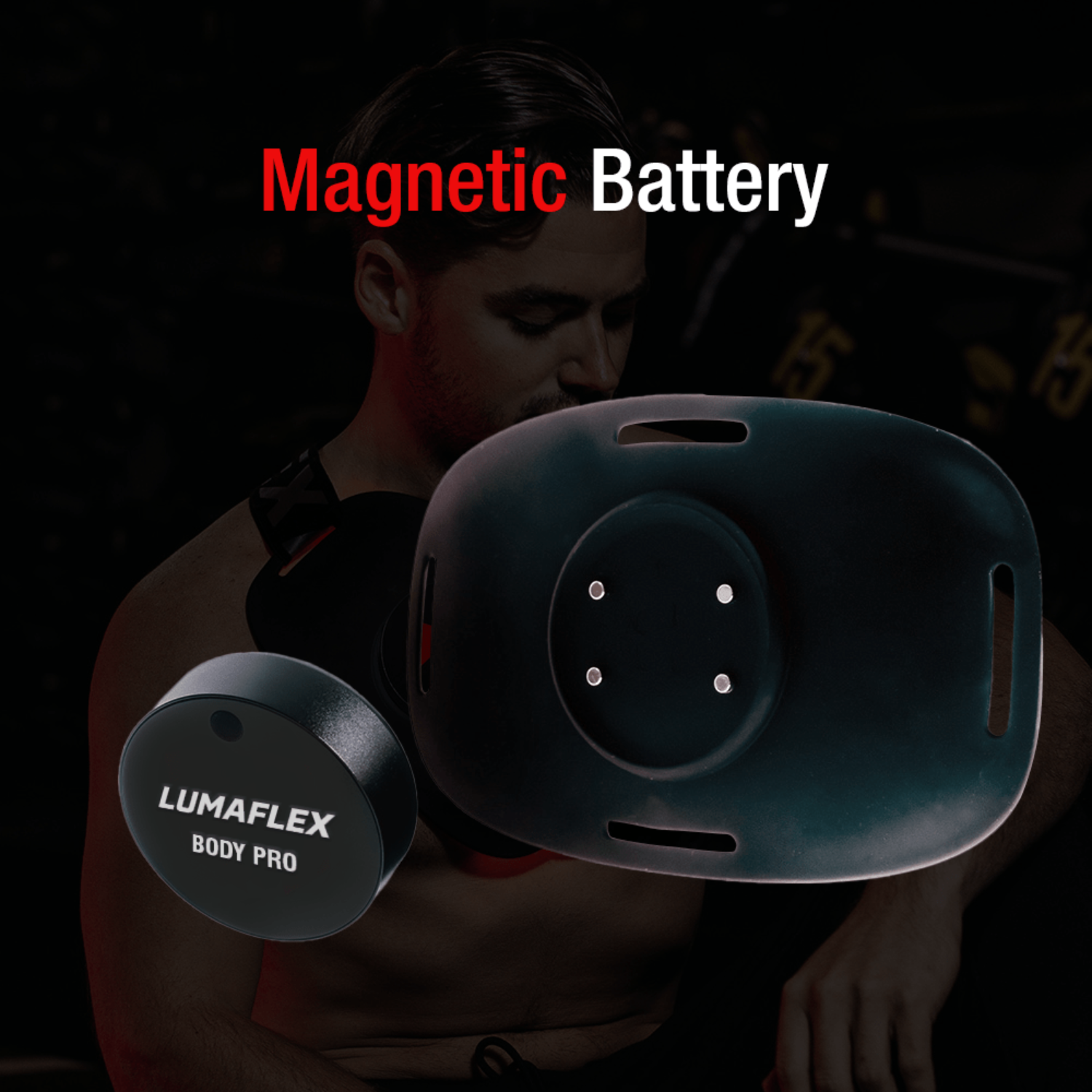 Lumaflex Body Pro magnetic battery device held by a person with a dark background